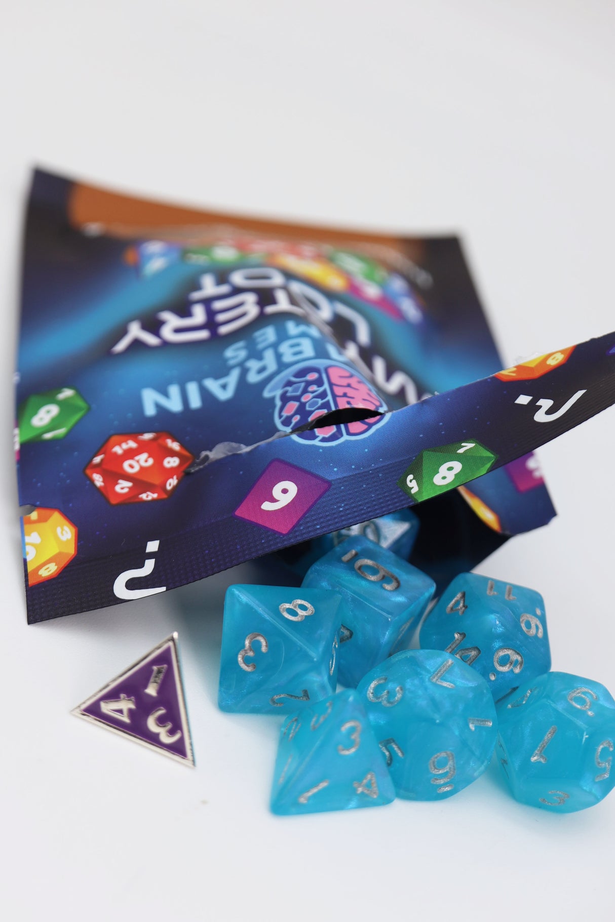 Mystery Loot: Plastic RPG Dice Set & Bonus Metal Die Mystery Loot Foam Brain Games