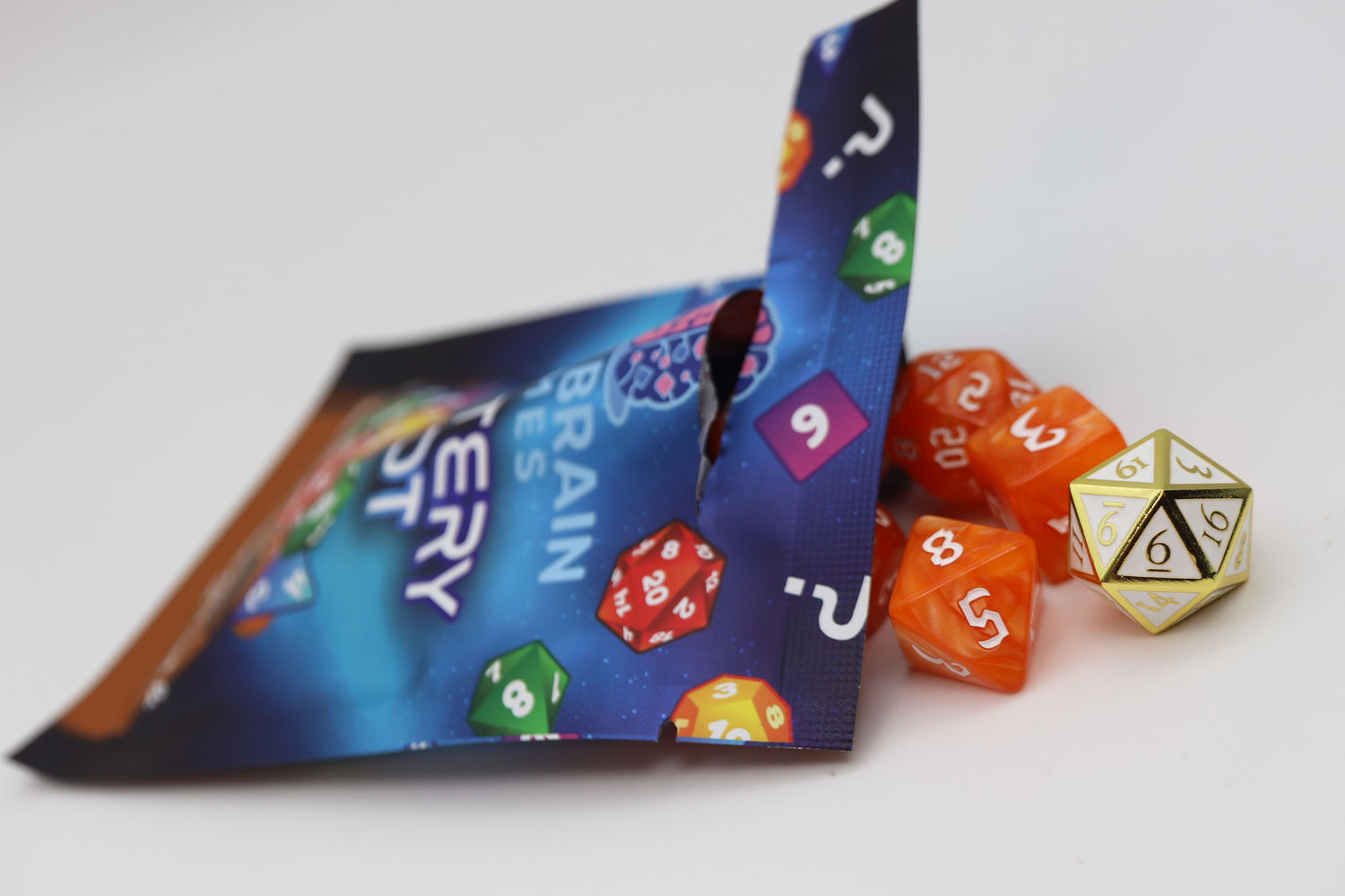 Mystery Loot: Plastic RPG Dice Set & Bonus Metal Die Mystery Loot Foam Brain Games