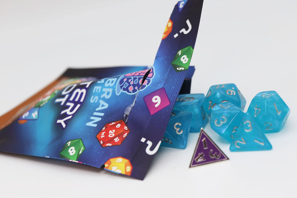 Mystery Loot: Plastic RPG Dice Set & Bonus Metal Die Mystery Loot Foam Brain Games