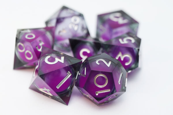 Sharp Edge Glow in the Dark Liquid Core RPG Dice Set - Violet Glimmer Plastic Dice Foam Brain Games