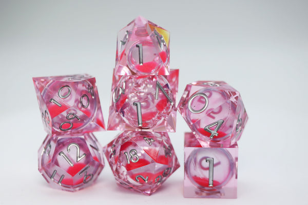 Sharp Edge Glow in the Dark Liquid Core RPG Dice Set - Radiant Pink Plastic Dice Foam Brain Games