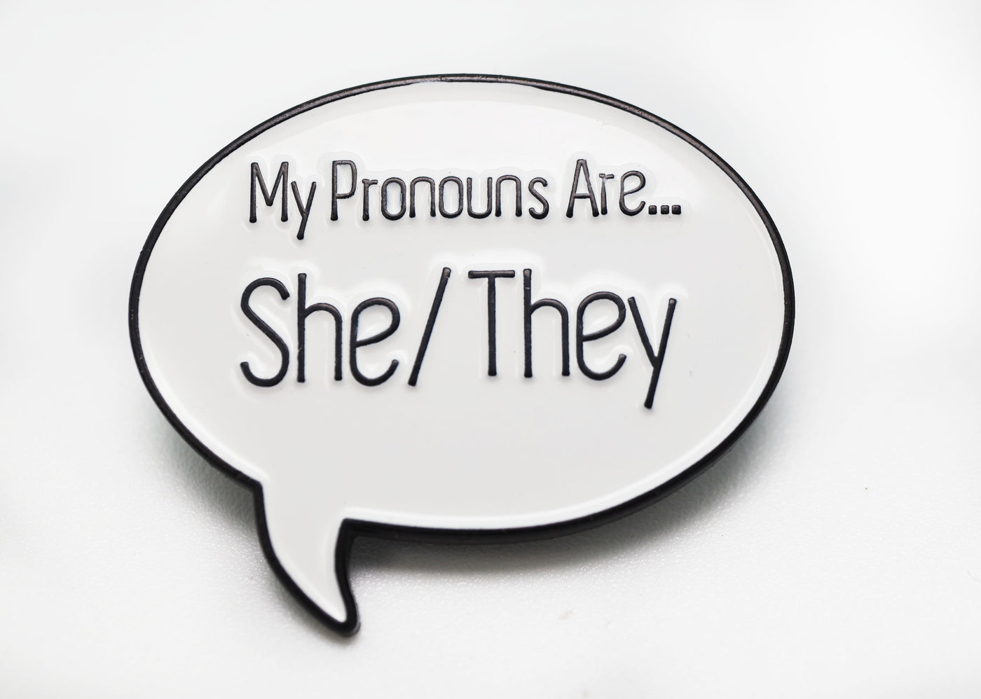 Speech Bubble Pin: She/They Pronouns Dice Tray Foam Brain Games