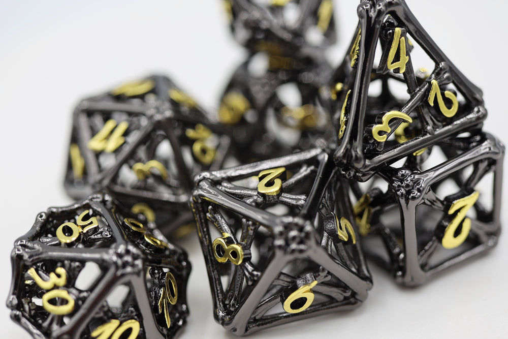 Night Bones - Hollow Metal RPG Dice Set Metal Dice Foam Brain Games