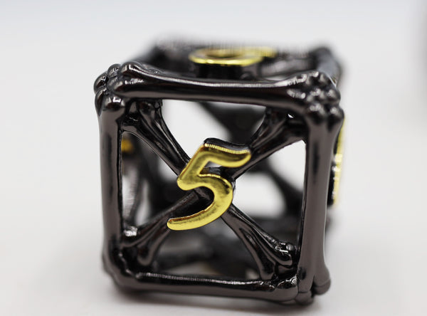 Night Bones - Hollow Metal RPG Dice Set Metal Dice Foam Brain Games