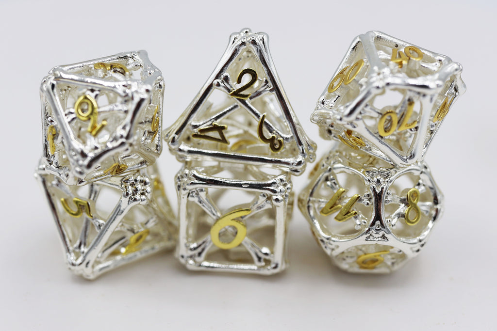 Holy Bones - Hollow Metal RPG Dice Set Metal Dice Foam Brain Games