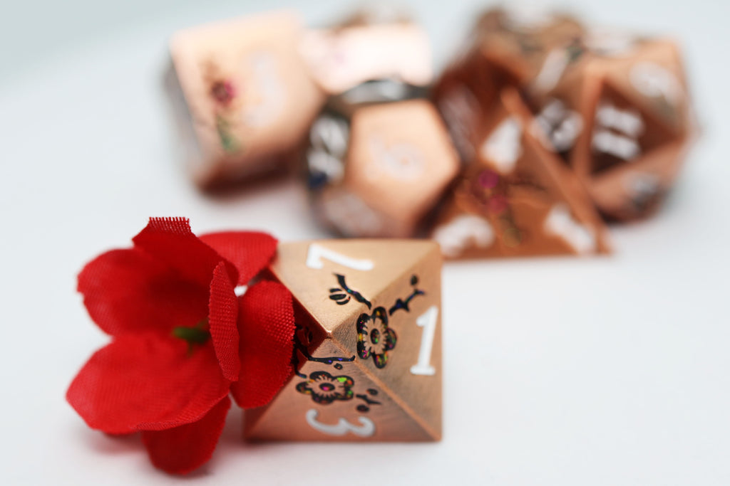 Metallic Bouquet: Copper with Red Orchids - Metal RPG Dice Set Metal Dice Foam Brain Games