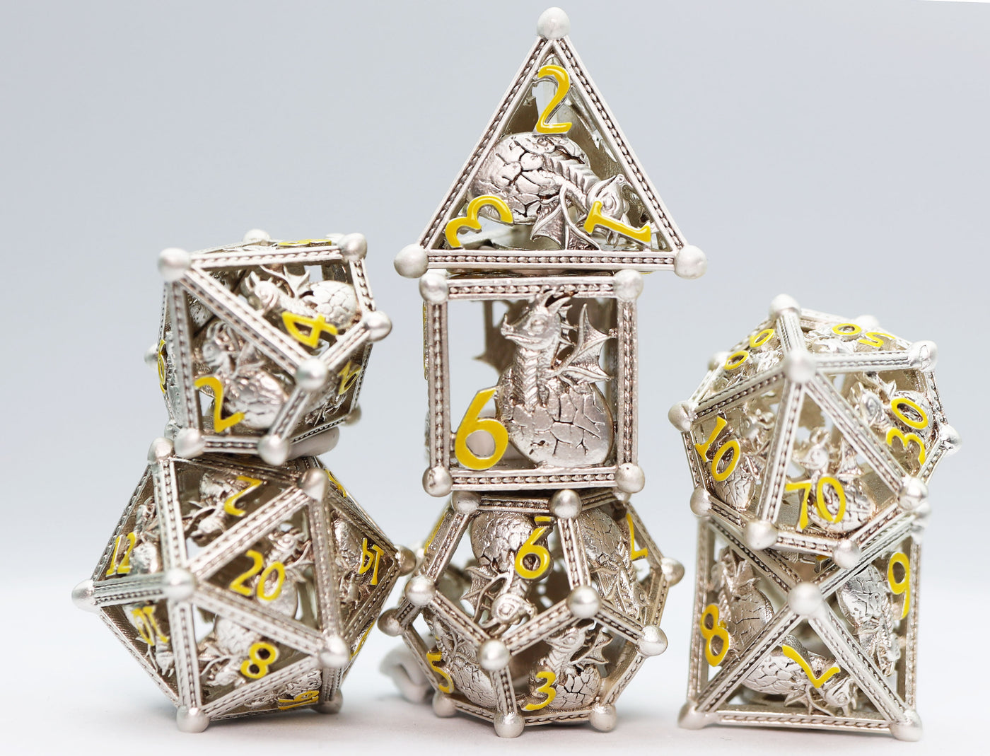 Silver Hatching Dragon - Hollow Metal RPG Dice Set Metal Dice Foam Brain Games