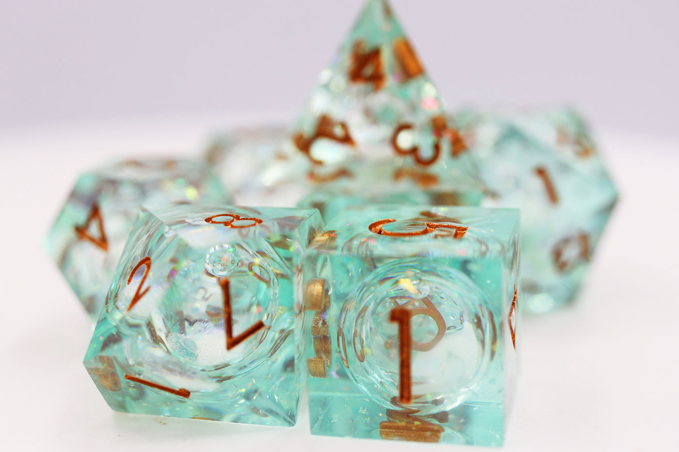 Sharp Edge Liquid Core RPG Dice Set - Green Plastic Dice Foam Brain Games