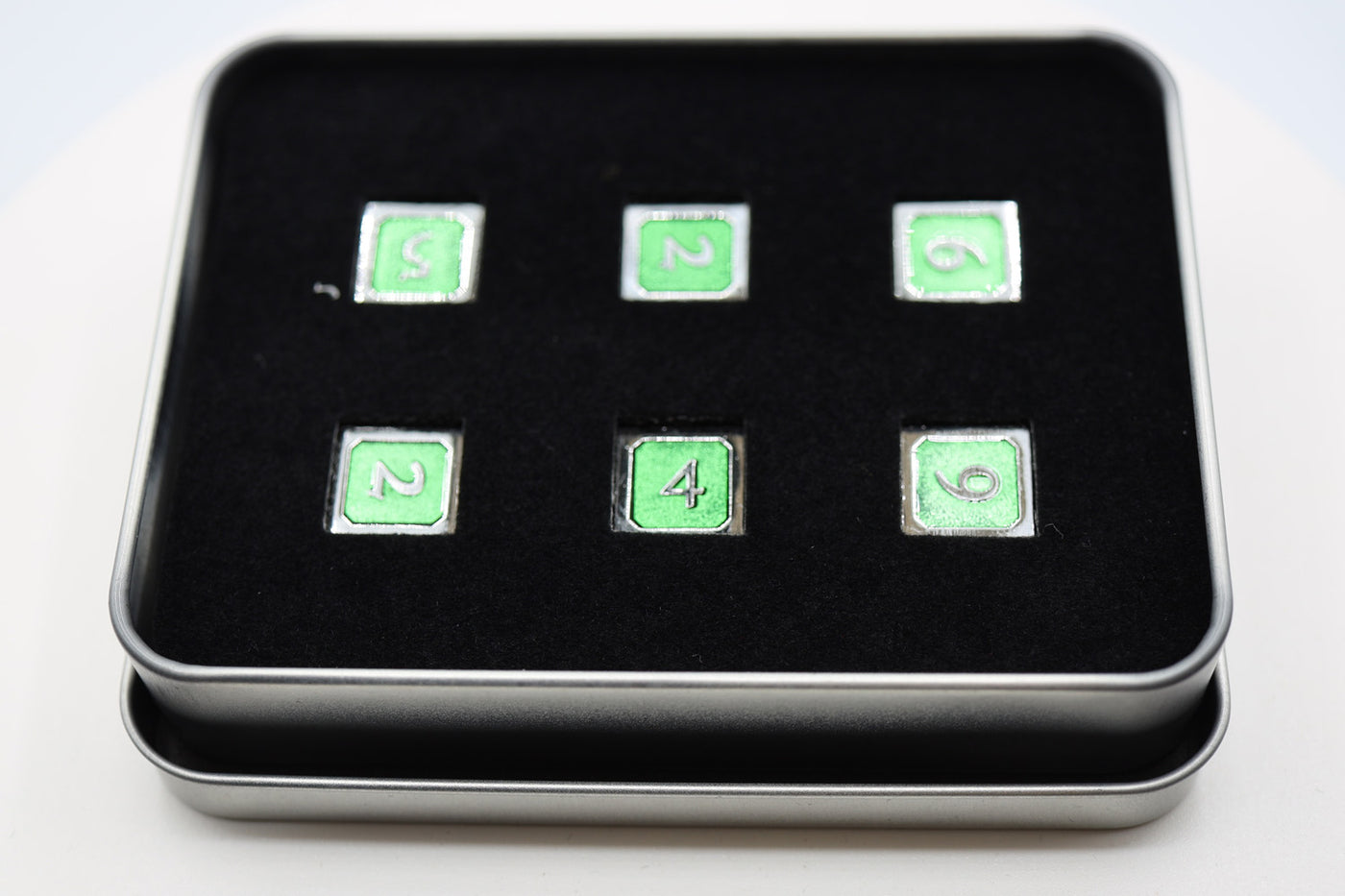 6 piece Metal D6's - Green and Silver Metal Dice Foam Brain Games
