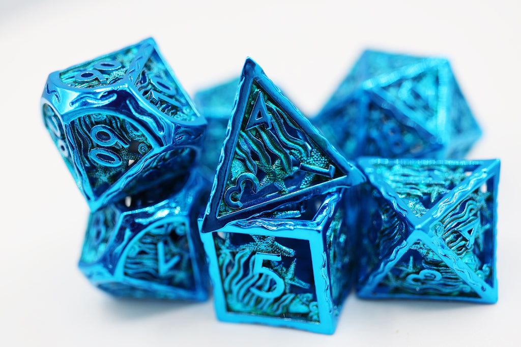 Seascape: Electro Blue - Hollow Metal RPG Dice Set Metal Dice Foam Brain Games