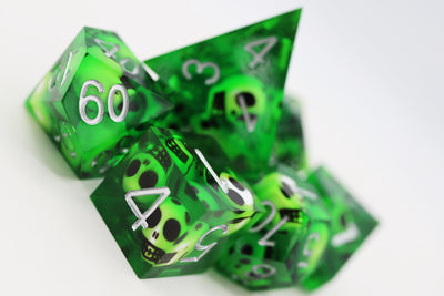 Sharp Edge Resin RPG Dice Set - Green Skulls Plastic Dice Foam Brain Games