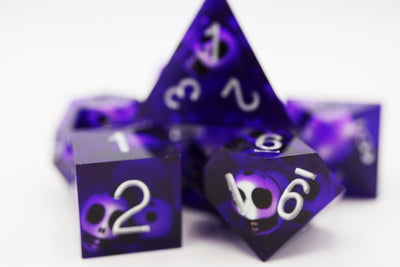 Sharp Edge Resin RPG Dice Set - Purple Skulls Plastic Dice Foam Brain Games