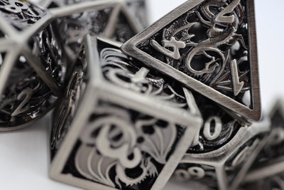 Dragon Essence: Silver - Hollow Metal RPG Dice Set Metal Dice Foam Brain Games